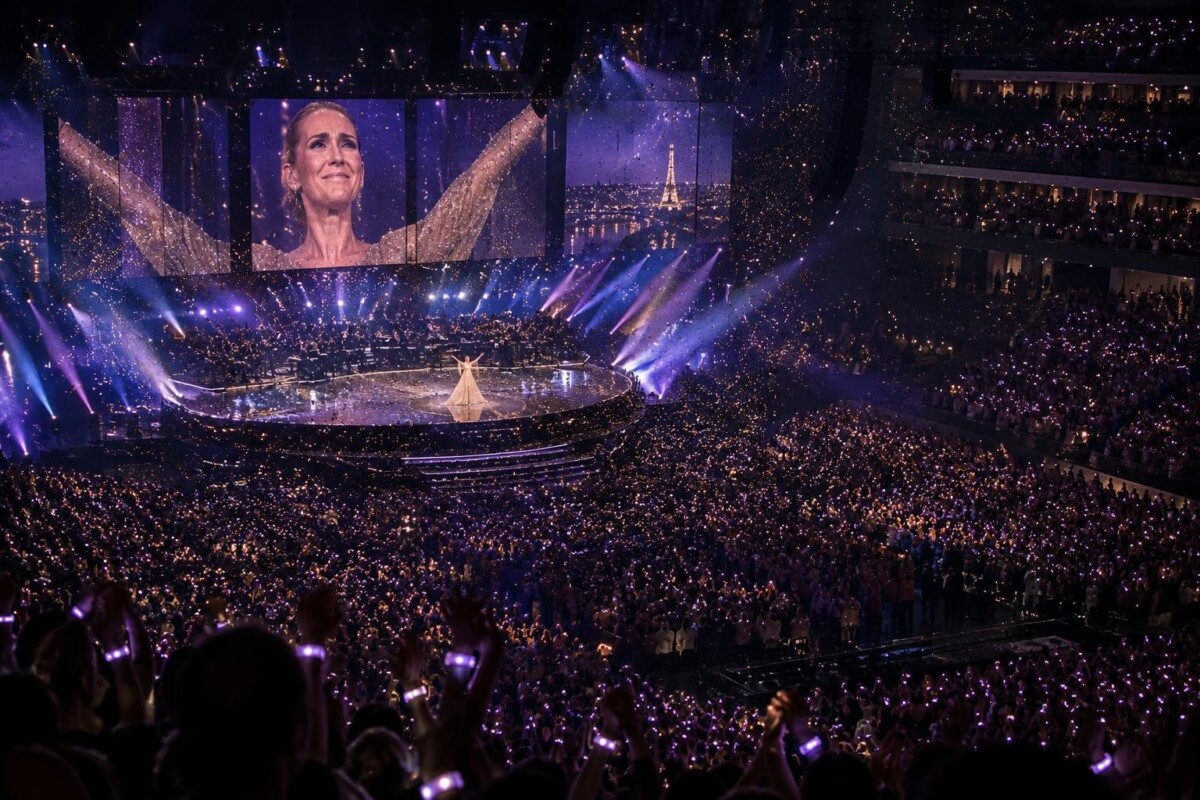 Céline Dion salue la foule à la Paris La Défense Arena lors de son dernier concert (image générée par IA)